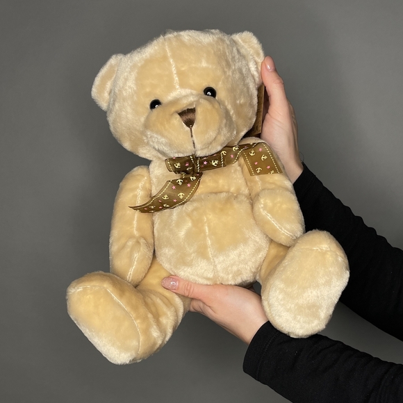 Игрушка медведь с бантом бежевый 25 см