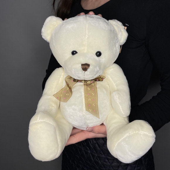 Игрушка медведь с бантом кремовый 25 см